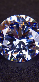 Sparkling diamond on a dark blue surface for mobile wallpaper.