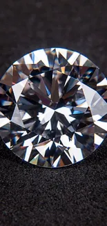 Bright diamond on a black surface, displaying elegant shimmer.