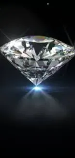 Brilliant diamond on black background, sparkling with light.