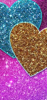 Glittery blue and gold hearts on a pink background, sparkling and vibrant.