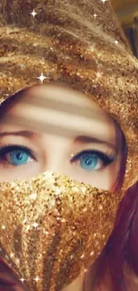 Masked figure in gold with sparkling effects and bright blue eyes.