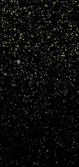 Sparkling golden stars on a black background, creating an elegant wallpaper.