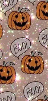 Cute Halloween phone wallpaper with smiling pumpkins and sparkles.