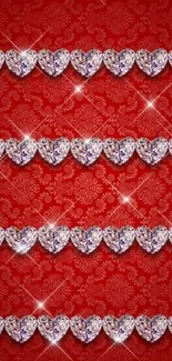 Red wallpaper with sparkling heart jewels.