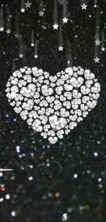 Heart-shaped crystal design on a glittery black background.