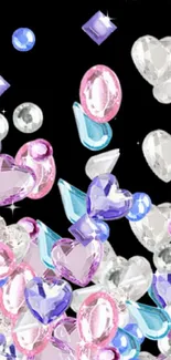 Sparkling pastel heart-shaped gem wallpaper on black background.