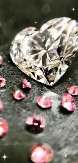 Heart-shaped diamond with pink gemstones on black background.