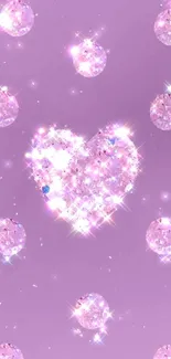 Mobile wallpaper with a sparkling heart on a purple background with diamond effects.