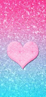 Pink heart on glittery pink to blue gradient background wallpaper.