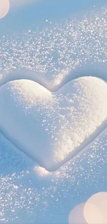Heart shape in snow with sparkling light reflections.