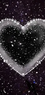 Heart with diamond border against starry night sky.