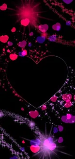 Sparkling heart with pink and purple starry design on black background.