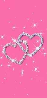 Pink wallpaper with sparkling diamond hearts and glitter accents.