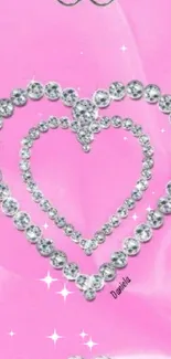 Pink heart wallpaper with crystal embellishments.