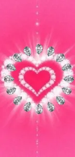 Glamorous sparkling diamond heart on pink background wallpaper.