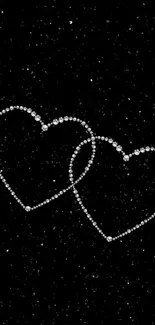 Mobile wallpaper with sparkling heart outlines on a black background.