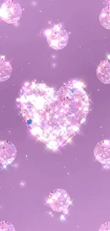 Purple wallpaper with sparkling heart and glittering jewels.