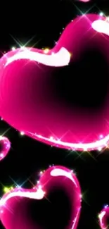 Vibrant wallpaper with sparkling pink hearts on dark backdrop.