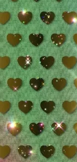 Mobile wallpaper with green background and sparkling golden hearts.