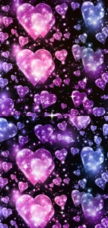 Sparkling pink and purple hearts galaxy wallpaper with starry background.