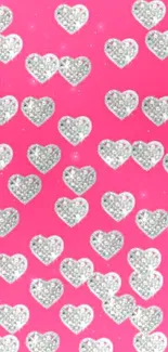 Sparkling silver hearts on a vibrant pink background mobile wallpaper.