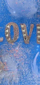 Sparkling 'Love' text with blue feathers on a vibrant background.