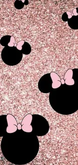 Sparkling Minnie Mouse wallpaper with pink glitter background and bow patterns.