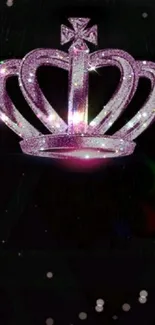 Glittering pink crown on dark background wallpaper.