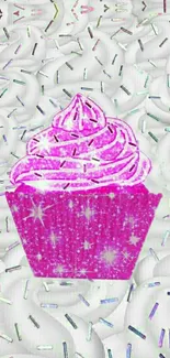 Vibrant pink cupcake with glitter on a sprinkle background.