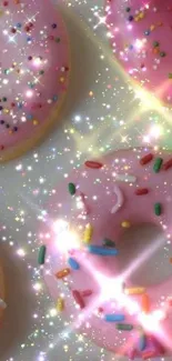 Sparkling pink donut wallpaper with colorful sprinkles.