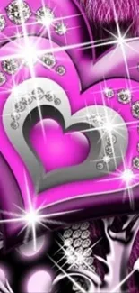Sparkling pink heart with silver accents and crystals.