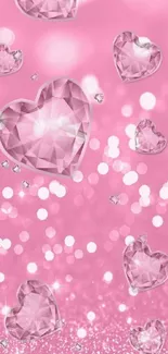 Pink wallpaper with sparkling crystal hearts and glittering effects.