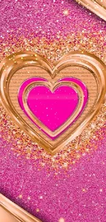 Pink heart wallpaper with gold accents and sparkling texture.