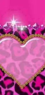 Pink heart with leopard print and sparkles on mobile wallpaper.