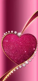 Sparkling pink heart with diamonds and gold accents on a wallpaper.