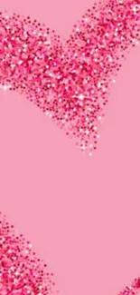 Pink sparkling heart wallpaper for mobile phones.