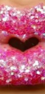 Close-up of sparkling pink lips with heart shape.