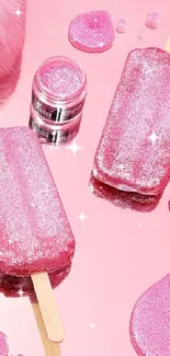 Glittery pink popsicles on a glossy pink surface.