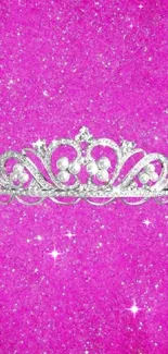 Sparkling pink wallpaper with a silver tiara centerpiece.