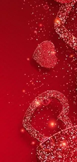 Sparkling red heart wallpaper with glittering design.