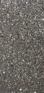 Close-up of sparkling silver glitter texture, perfect for a dazzling mobile wallpaper.