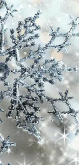 Mobile wallpaper of a silver snowflake on a shimmering background.