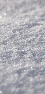 Close-up of sparkling snow texture on a mobile wallpaper.