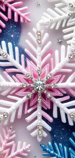 Sparkling pink, white, and blue snowflake wallpaper