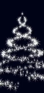 Starry Christmas tree on deep blue background, perfect for holiday wallpaper.