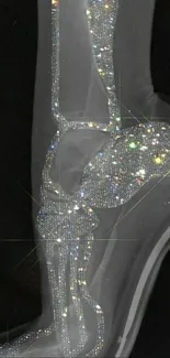 Sparkling stiletto adorned with crystals on black background.