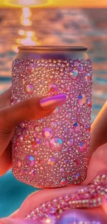 Luxurious pink diamond can with sunset beach background.