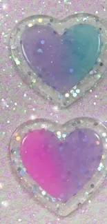 Sparkly heart wallpaper with pink and pastel glitter background.