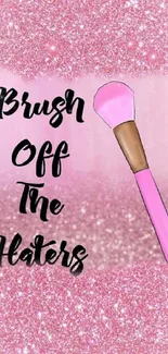 Sparkly pink wallpaper with makeup brush.