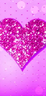 Sparkly pink heart on a purple dotted background wallpaper.